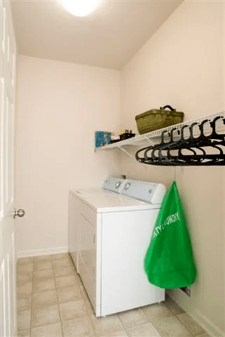 Laundry room at Village on the Lake Apartments, Spring Lake, 28390